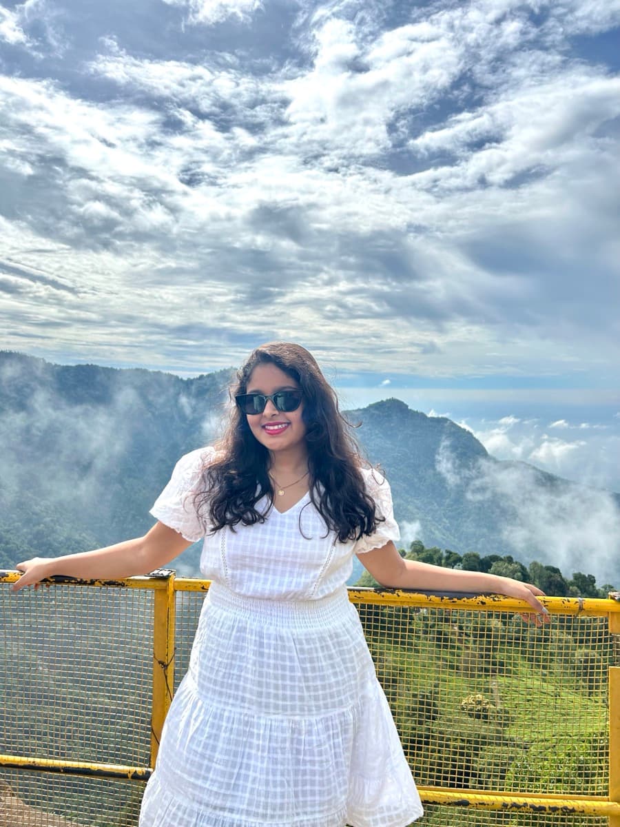 Aditi on a mountain viewpoint